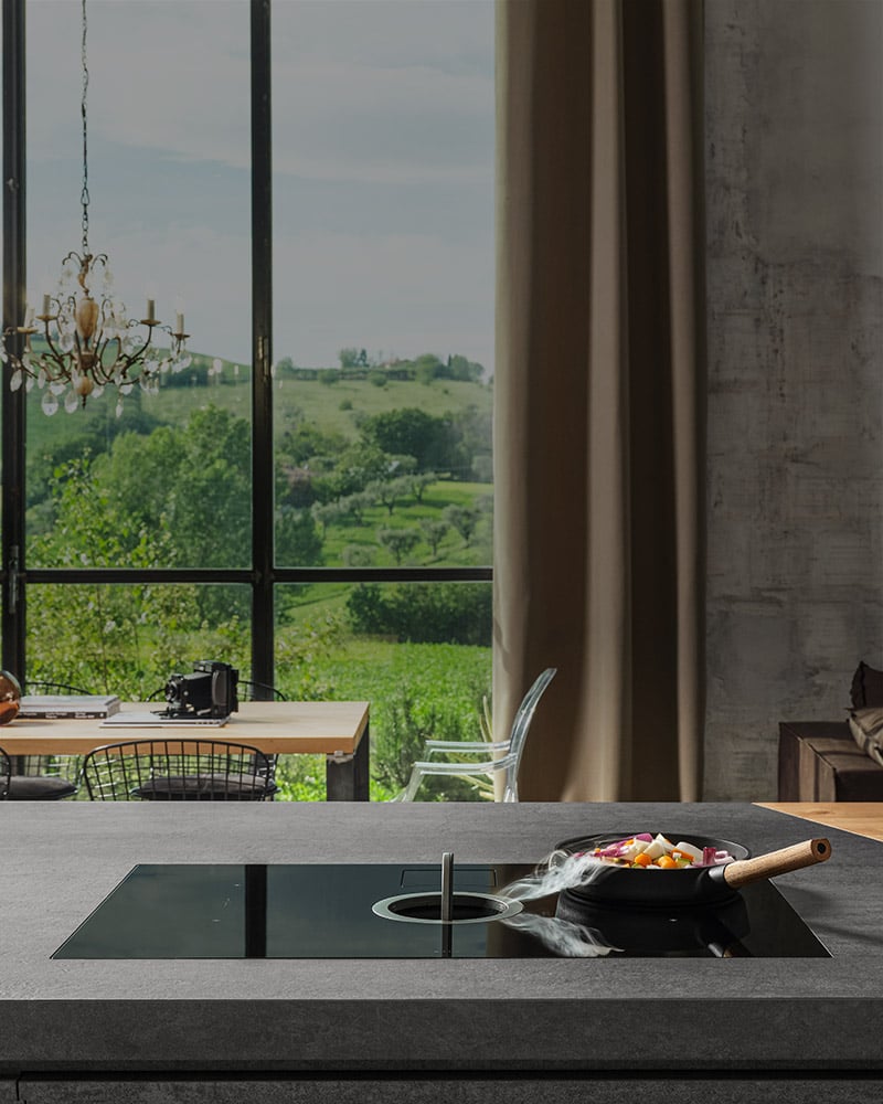 Piani a induzione con cappa integrata vs. Soluzioni separate top-m