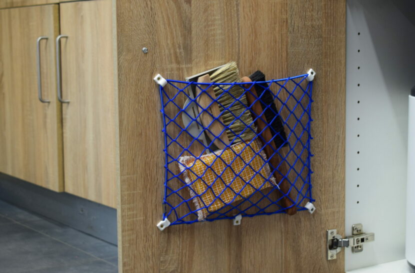 Filt 1860: Tradizione e Innovazione nel Design Sostenibile filt1860-filet-de-rangement-bleu-cuisine